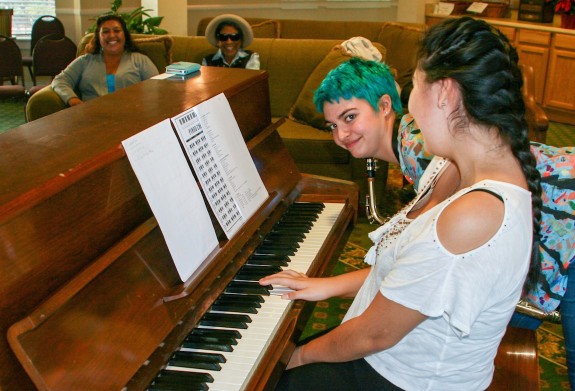 Garden Street Academy Jazz Band Members Play Piano at Garden Court Retirement Community